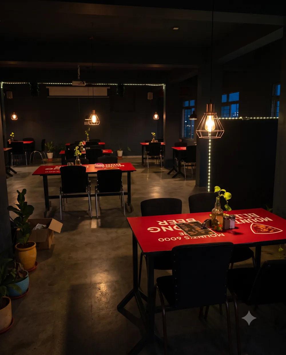 Inside Bottles Up — low-lit resto-bar seating